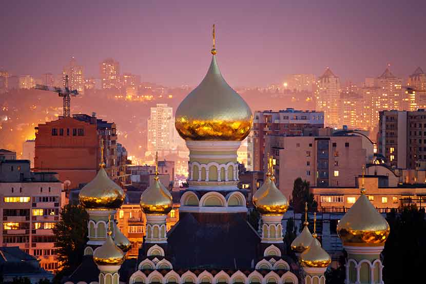Gold spires of Ukraine at sunset