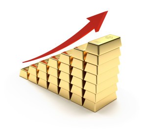 Bar graph built out of gold bars and red arrow indicating gold hitting three month high