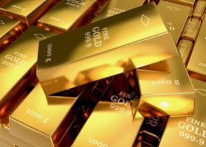 Multiple stacks of 1000 gram fine gold bars