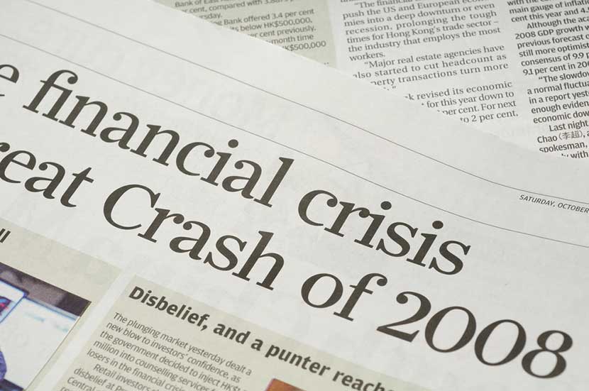 Close-up of newspaper headlines concerning the financial crash of 2008