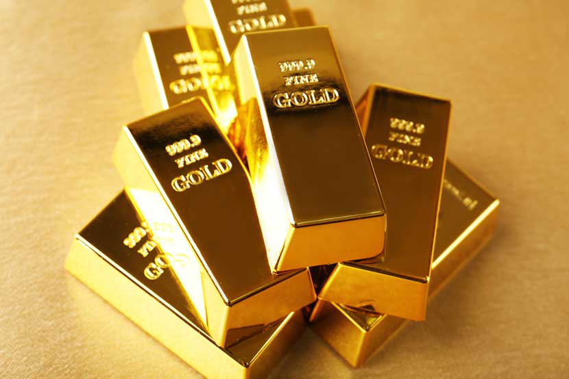 Stack of 999.9 fine gold bars in pristine condition