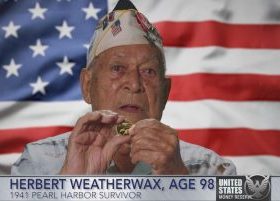 Herbert Weatherwax, 1941 Pearl Harbor Survivor holding 24-karat Pearl Harbor Gold Coin