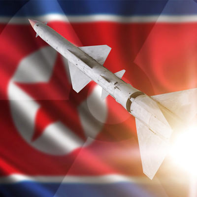North Korean flag with missile.