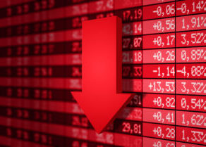 Volatile stock market charts with red arrow pointing down