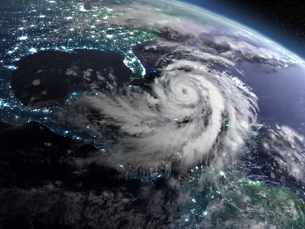 View of earth from space with hurricane brewing over America