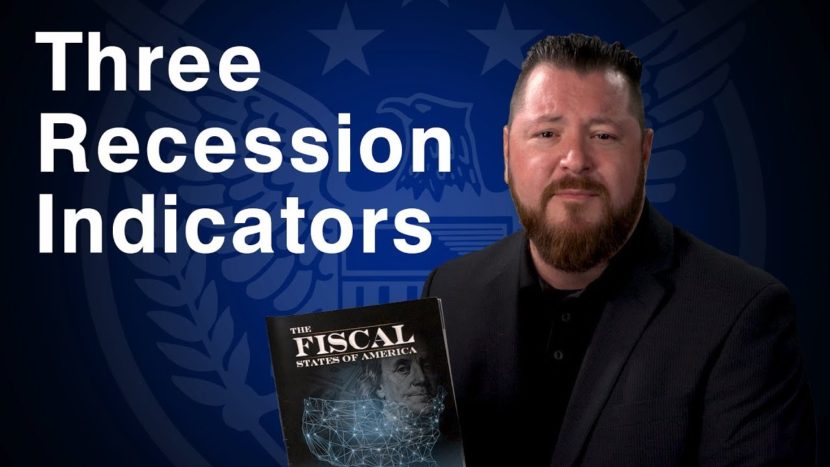 blue background with white text that says "three recession indicators" next to Patrick Brunson holding an informational book