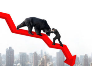 Graphic that represents a recession with a bear crawling down a trend line over a city skyline