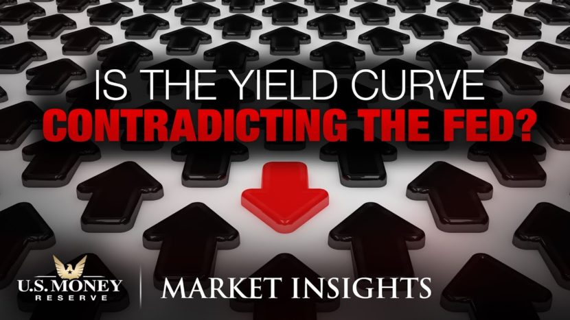 Is the Yield Curve Contradicting the Fed?