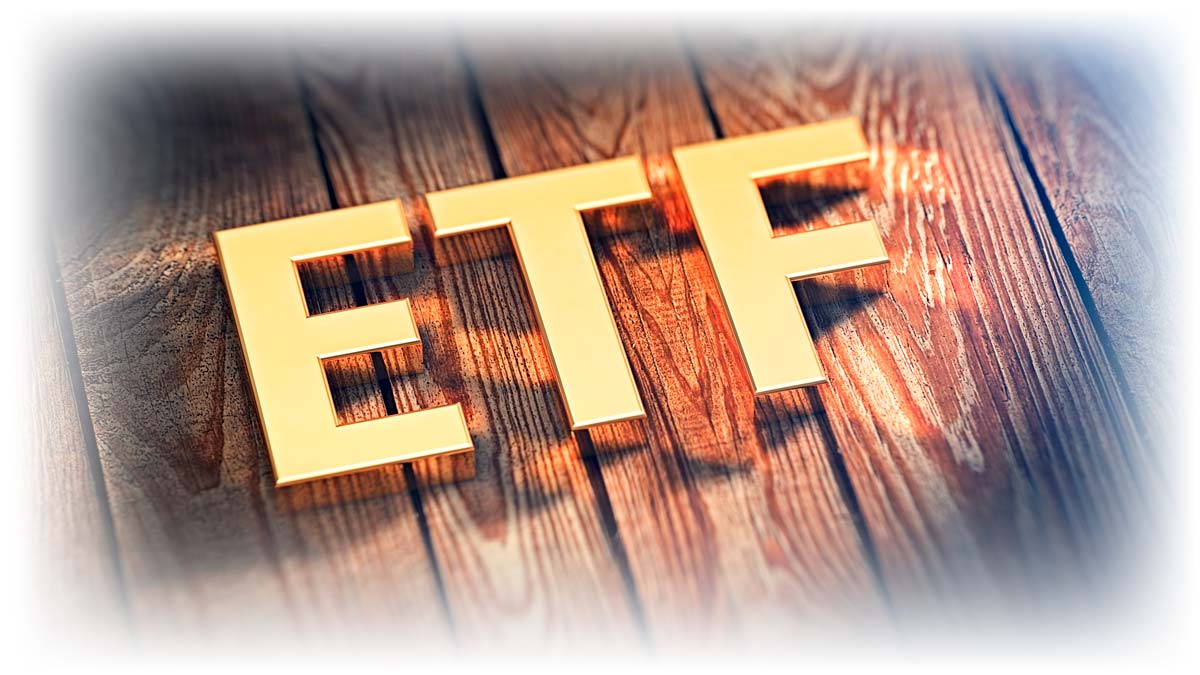 Letters ETF in gold over wood planks