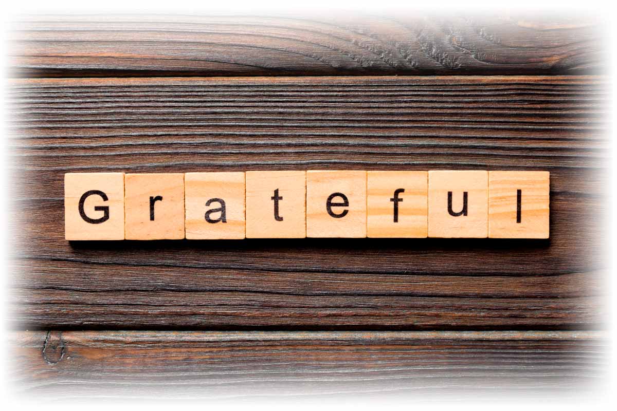 Grateful spelled out using Scrabble letters