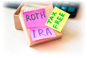 Small box with cash inside labeled “ROTH IRA TAX FREE”