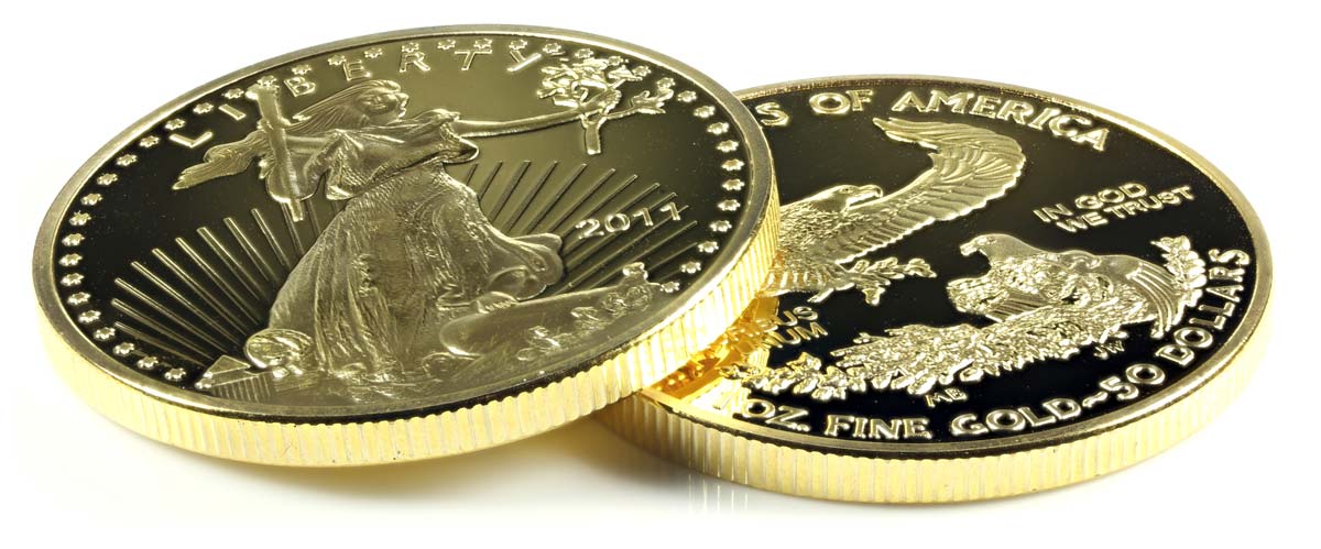 1 ounce American gold eagle bullion coins isolated on white