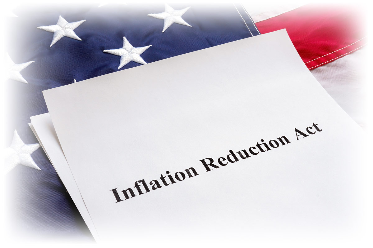 Papers with the Inflation Reduction Act and US flag