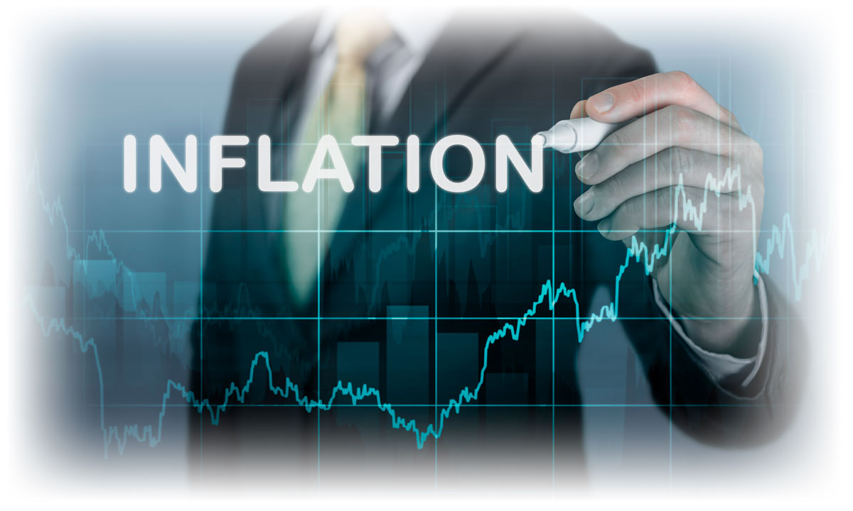 Businessman writing word “INFLATION” above upwards-trending data chart