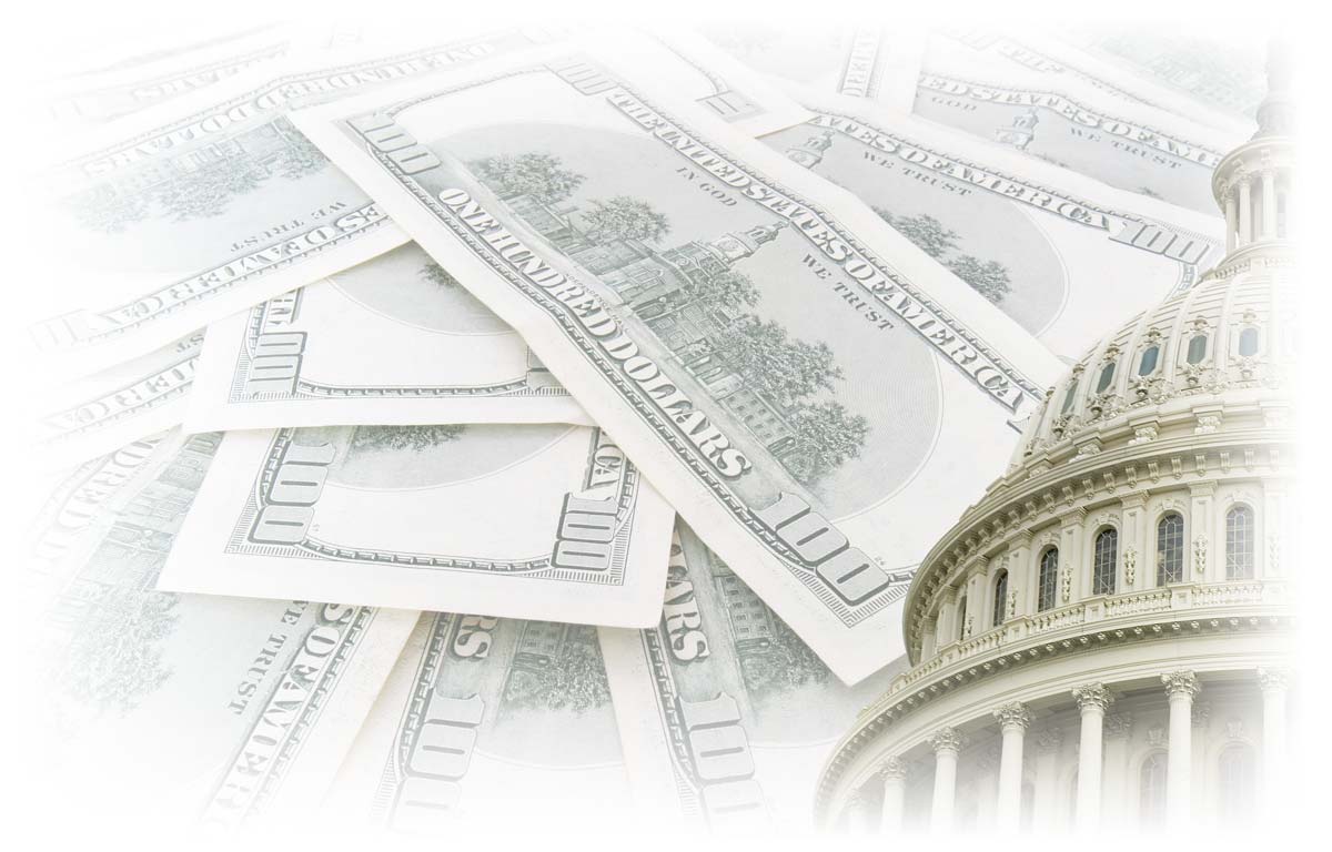 U.S. Capitol dome in front of wall of $100 notes