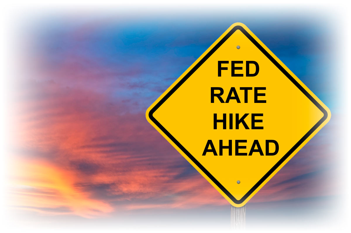 Road sign reading "FED RATE HIKE AHEAD"