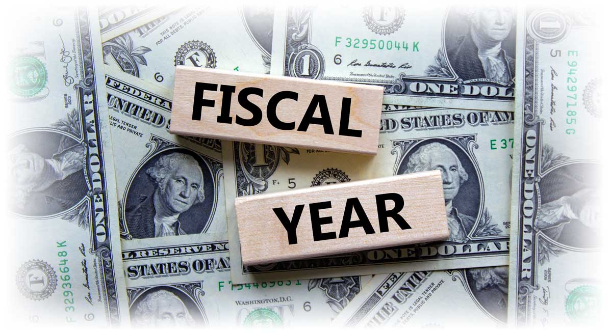 Word blocks reading "FISCAL YEAR" over $1 notes
