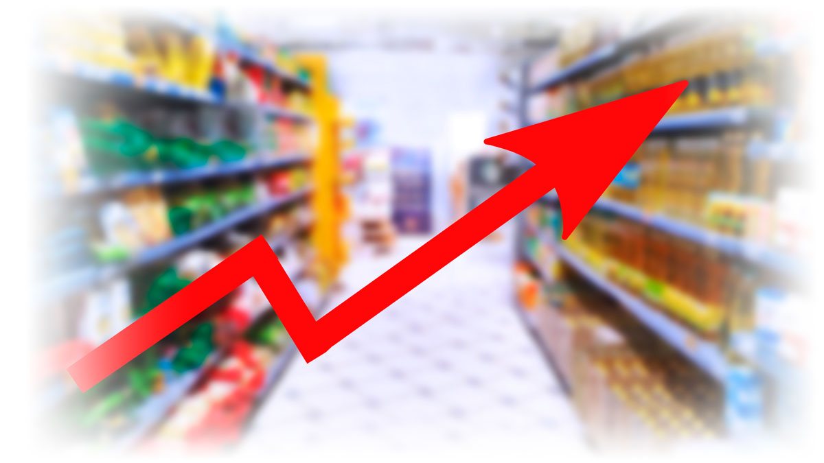 Upward-trending red arrow over blurred image of grocery aisle