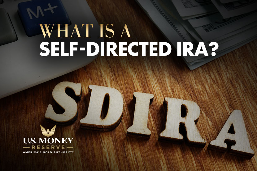 Letters "SDIRA" on a desk with text "What Is A Self-Directed IRA?"
