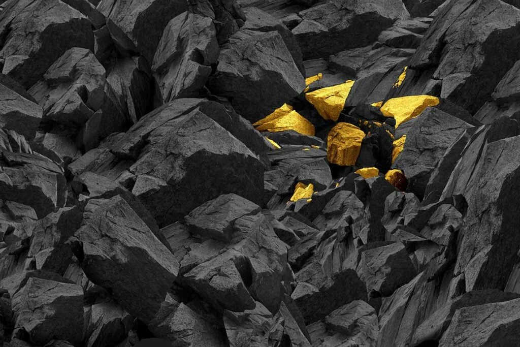 Gold nuggets among mined materials