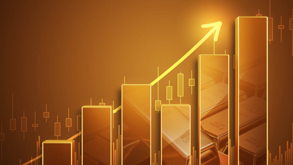 Gold bars with rising arrow and chart